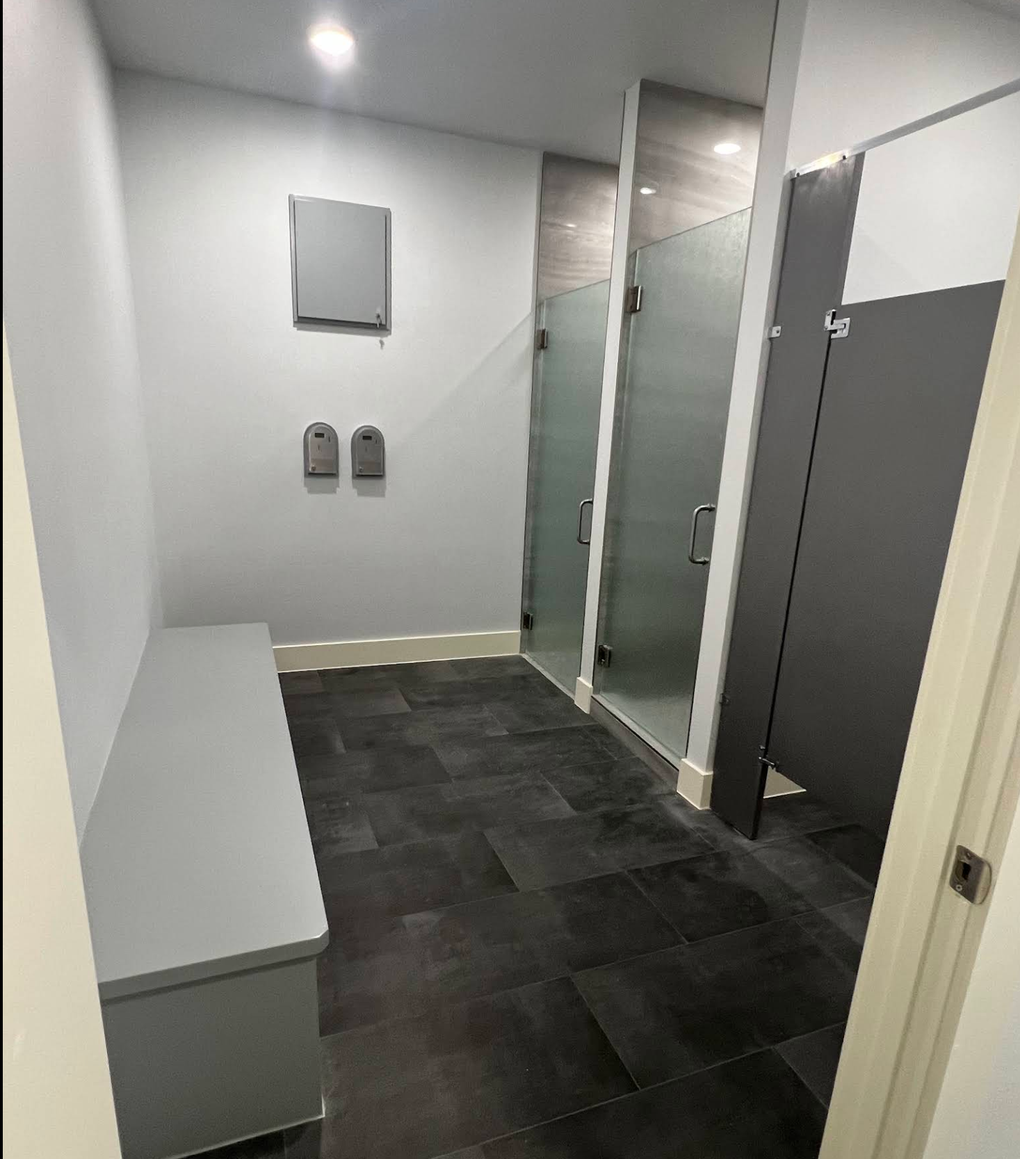 Interior of the clean restroom area with private stalls